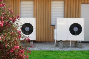 Eco-Friendly Air Source Heat Pumps at Modern Home Facade