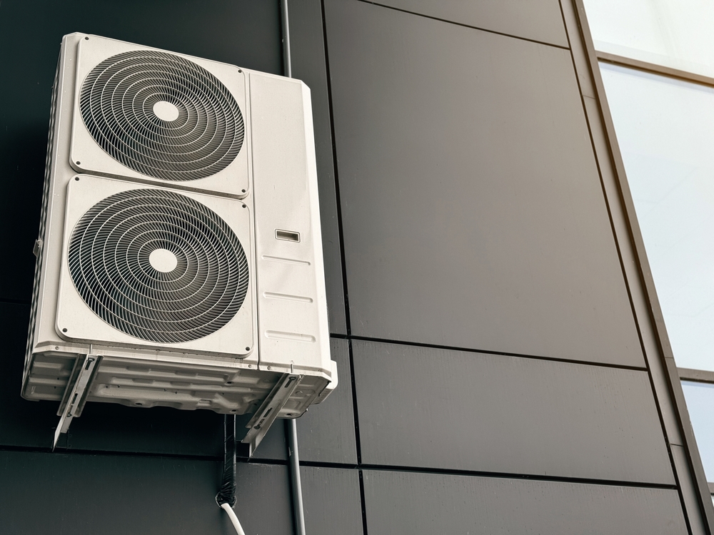 Outdoor HVAC units on steel-framed modern building
