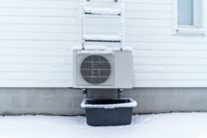 A heat pump outdoor unit efficiently provides warmth and energy savings in snowy winters. Proper installation and maintenance ensure reliable heating even in freezing temperatures.