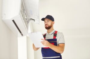 portrait,of,a,young,professional,electrician,man,or,technician,holding