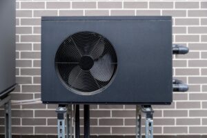 Front,View,Of,Black,Heat,Pump,Outdoor,Unit